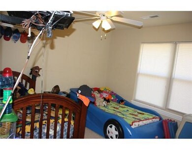 Bedroom. One of three badrooms on main floor.