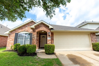 Charming single-story home with 4 sided brick exte