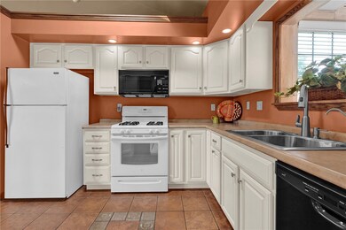 So much natural light makes this kitchen a place t
