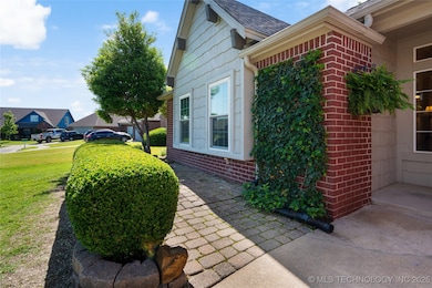 Lush, low-maintenance landscaping meets timeless c