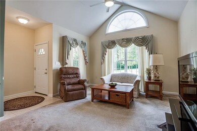 Custom Draperies adorn the Living Room Windows
