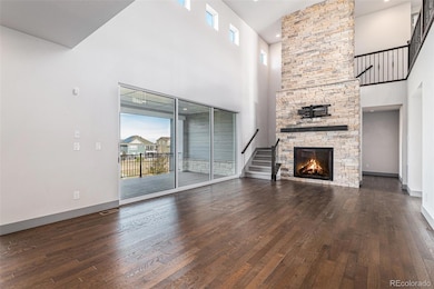 Dramatic two story living room is sure to leave your jaw on the floor.