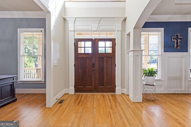 A 2 story grand foyer and stunning double doors is the perfect entry to this beautiful home.