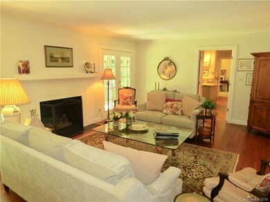 Living Room with french doors to back yard, firepl
