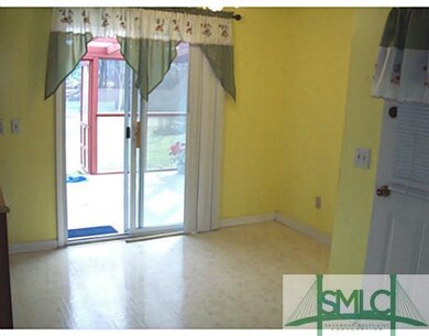 Kitchen. Breakfast Area showing door going outside