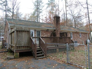 Rear View of Home and Deck, Chain Link Fencing,Pav