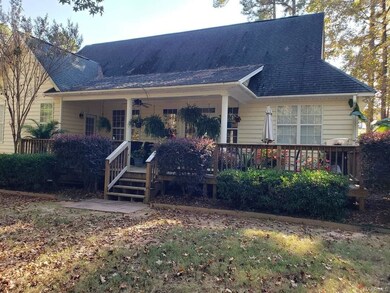 Back of house; covered patio.