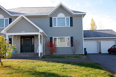 Lower, right unit with adjoining garage