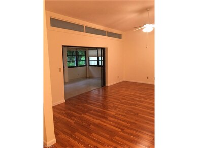 VIEW OF GREAT ROOM AND GLASS ENCLOSED LANAI ADDING MORE LIVING SPACE