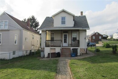 View of rear of house.  Another covered porch - si