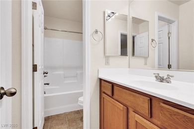 Full bath featuring vanity and shower / bathtub co
