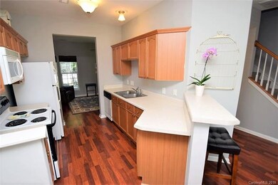 Open kitchen with breakfast bar