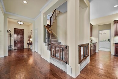 Step inside through the wood front door and appreciate all the beautiful features this home has to offer. The custom stair gates are easily removable.