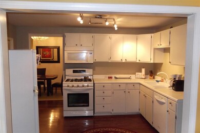 Hardwood floors and plenty of cabinets