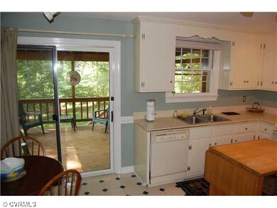 Kitchen - Kitchen leads out to the screen porch ov