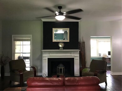 Great room with wood burning fireplace with gas lo