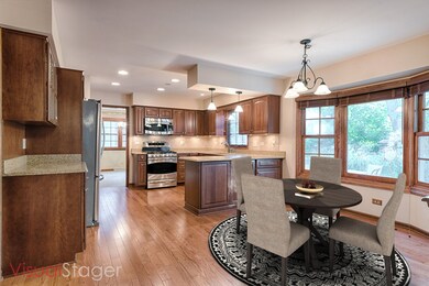 Spacious eat-in Kitchen with bay windows.