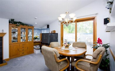 Great room/family room has dining area, patio door