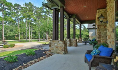 Large porch for your outdoor furniture. Great place for that morning cup of coffee and to listen to the peaceful sounds of the water in the fountain.