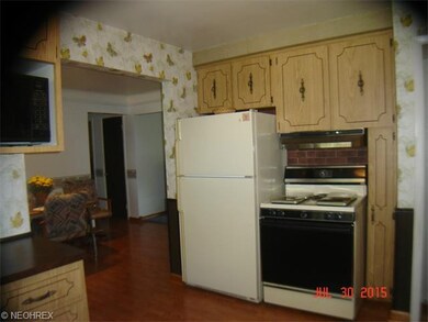 Third area of kitchen has MORE cabinets, PLUS refr