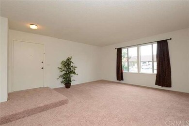 Living room looking at front door.