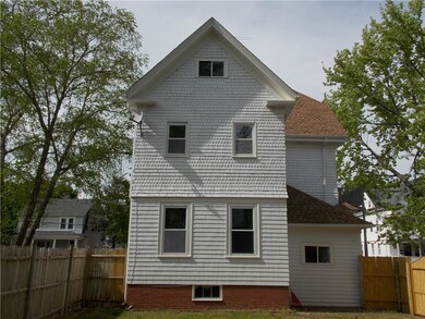 REAR VIEW OF 3 STORY HOME