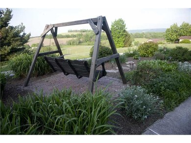 Land/Lot. Lovely flower beds with perennials and s