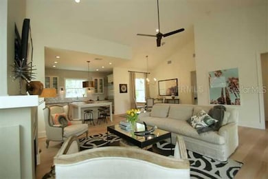 Gathering Room - Airy, open floor plan combines great room, dining area, large kitchen with eat-in island and pantryl