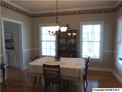 The 13'x12' Dining Room has room for all inside entertaining and flows into the kitchen.