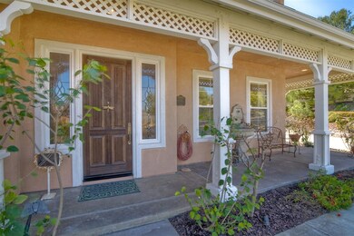 Inviting front porch and beautiful alder wood entry door