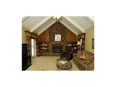 Living room with access to large private patio.