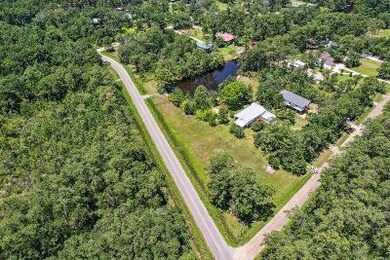 Aerial View of 2 Lots and Home Site