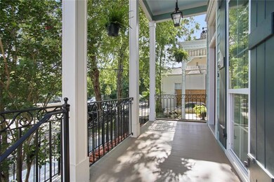Charming front porch with iron railing