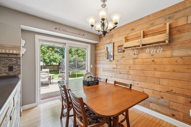 Dining room-leads out to the fenced backyard. Look at that accent wall!