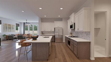 Kitchen featuring stainless steel appliances, a s