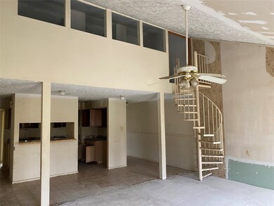 From back door to the right.