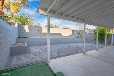 Fenced backyard featuring a patio