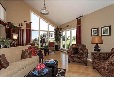 Stacked windows and large room. High ceilings and 