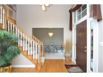 Entry/Foyer. Classic & neutral colors anchor the s