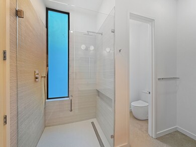 standupo shower in downsrtairs bedroom