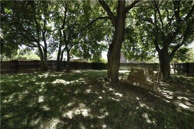 This secluded back yard is fully fenced with a privacy fence, great to entertain