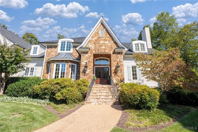 View of front of property with a front yard