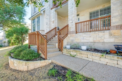 Property entrance with stone siding