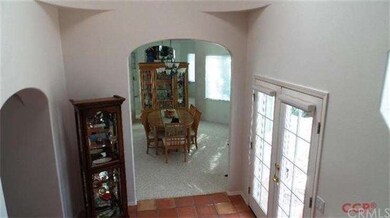 Looking from front entry landing down towards the 