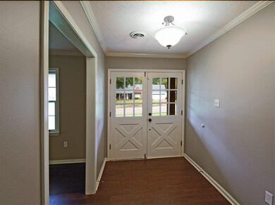 Open and light, the entry features engineered hard