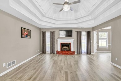 Unfurnished living room with visible vents, ceilin