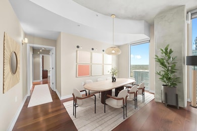 Dining area featuring floor to ceiling windows, d