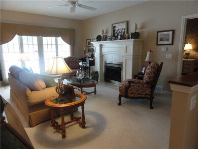 Living Room. French Wood doors open onto the cover