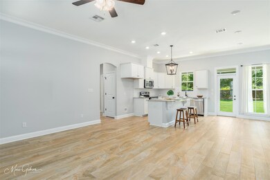 Kitchen with appliances with stainless steel finis