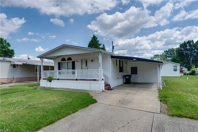 View of the home and carport